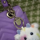 Colorful Splatter Cow Plush Bag Charm plush by Build-A-Bear
