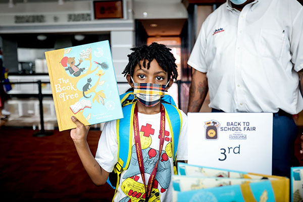child with book – Build-A-Bear Foundation