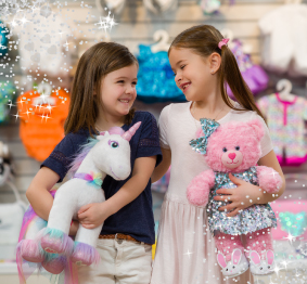 two friends holding plushies