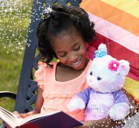 child reading to plushie